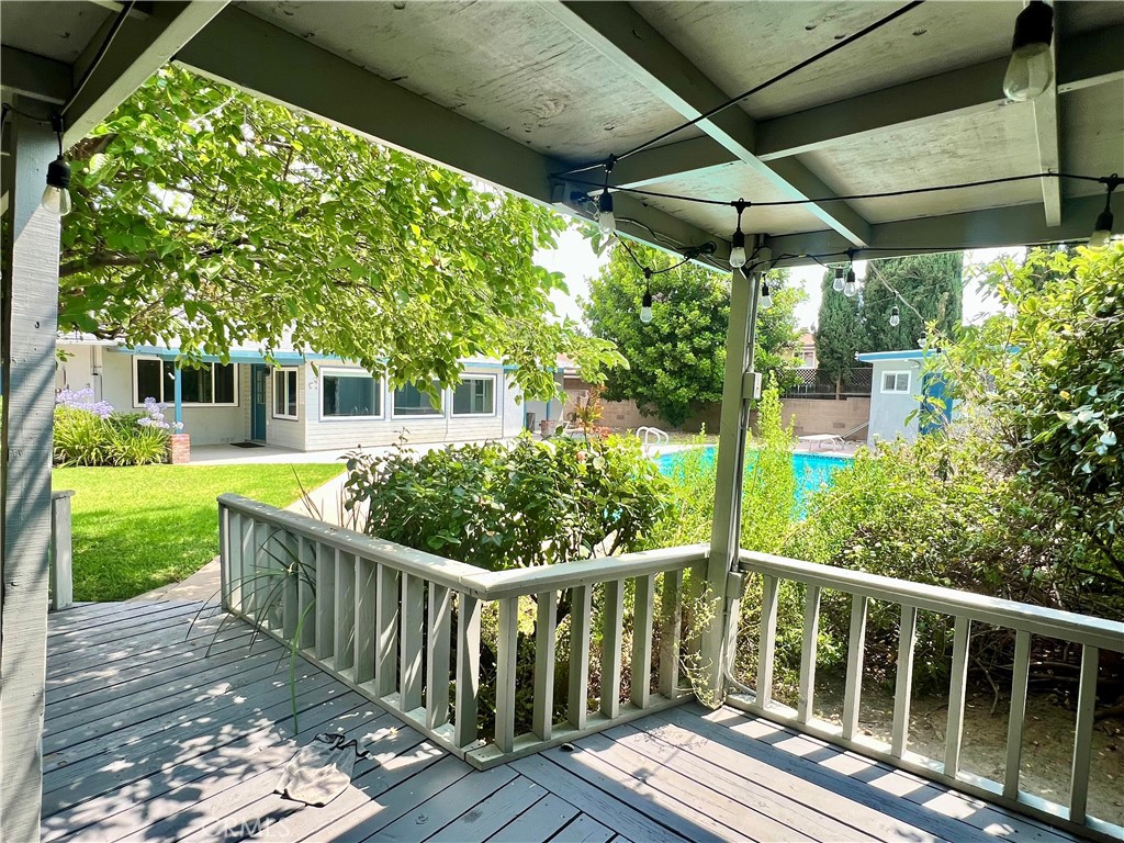 22734 Eccles Street West Hills, CA 91304 - Photo 11 of 19 a view of a wooden deck next to a yard