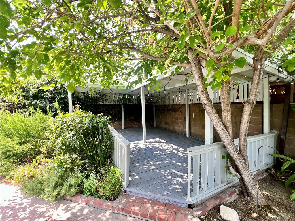 22734 Eccles Street West Hills, CA 91304 - Photo 14 of 19 a front view of a house with garden