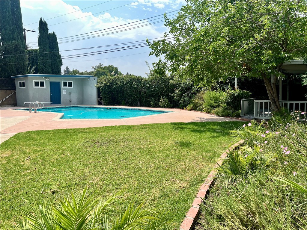 22734 Eccles Street West Hills, CA 91304 - Photo 19 of 19 a view of a backyard with plants and a patio