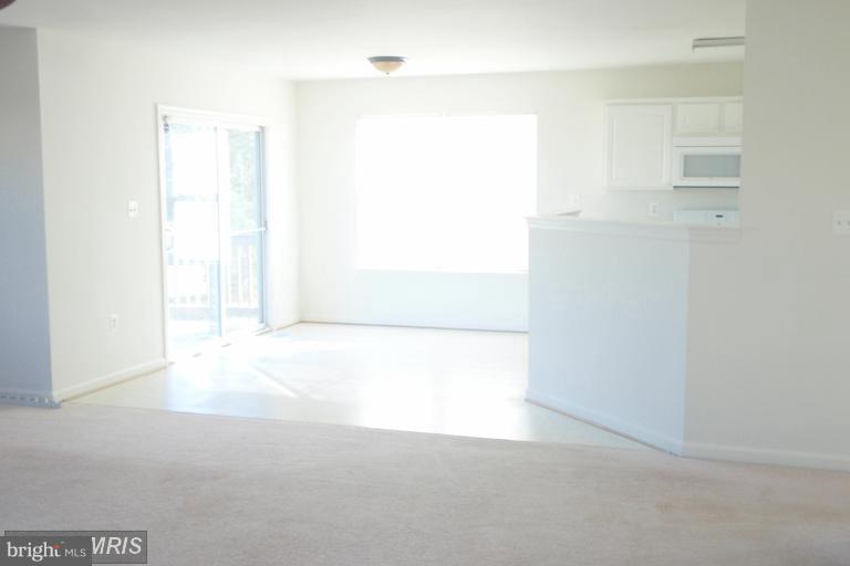 760 Holly Leaf Road Culpeper, VA 22701 - Photo 10 of 26 a view of a small space with wooden floor