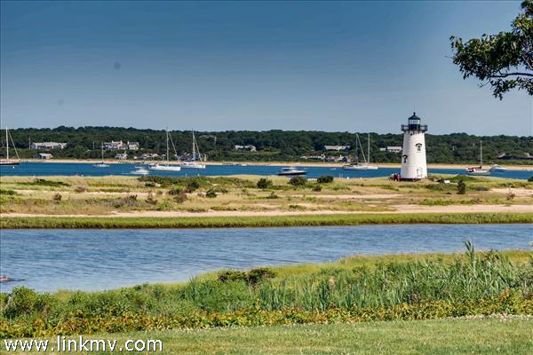 7 Starbuck Neck Road Edgartown, MA 02539 - Photo 2 of 41 a view of a swimming pool and lake view