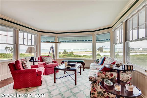 7 Starbuck Neck Road Edgartown, MA 02539 - Photo 17 of 41 a living room with furniture and floor to ceiling windows