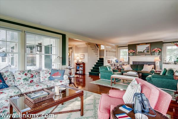 7 Starbuck Neck Road Edgartown, MA 02539 - Photo 21 of 41 a living room with furniture fireplace and a table