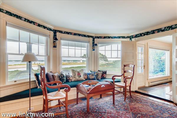 7 Starbuck Neck Road Edgartown, MA 02539 - Photo 23 of 41 a living room with furniture and a large window