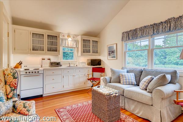 7 Starbuck Neck Road Edgartown, MA 02539 - Photo 38 of 41 a living room with furniture and a large window