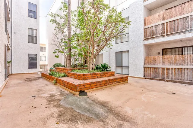 a view of a house with a street