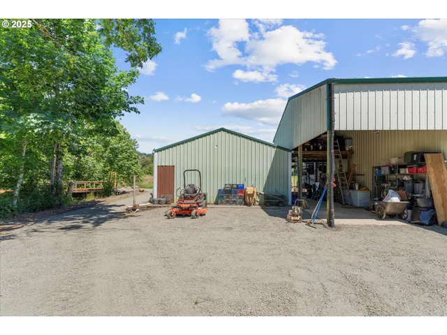 a view of a big room with furniture and a garage