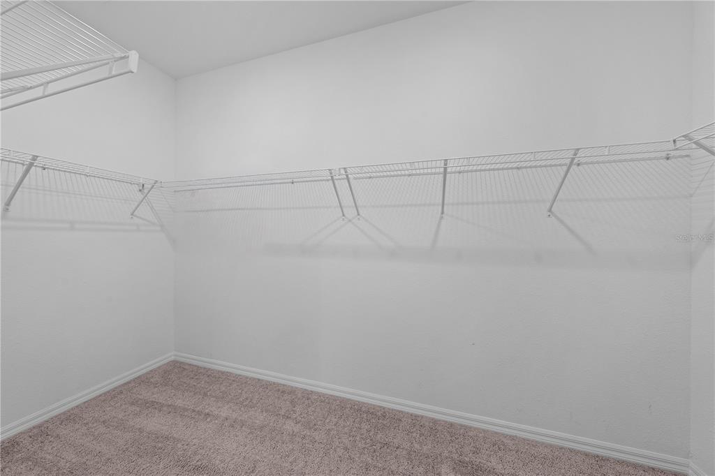 920 Livestock Loop St. Cloud, FL 34771 - Photo 26 of 55 a view of a room with racks on the wall