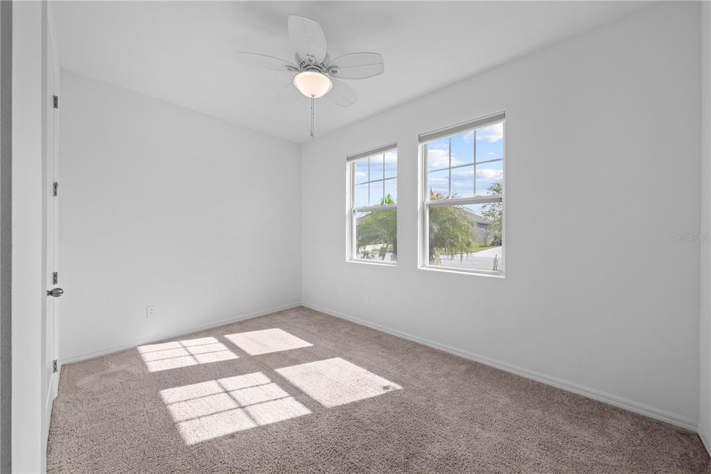 920 Livestock Loop St. Cloud, FL 34771 - Photo 39 of 55 an empty room with windows
