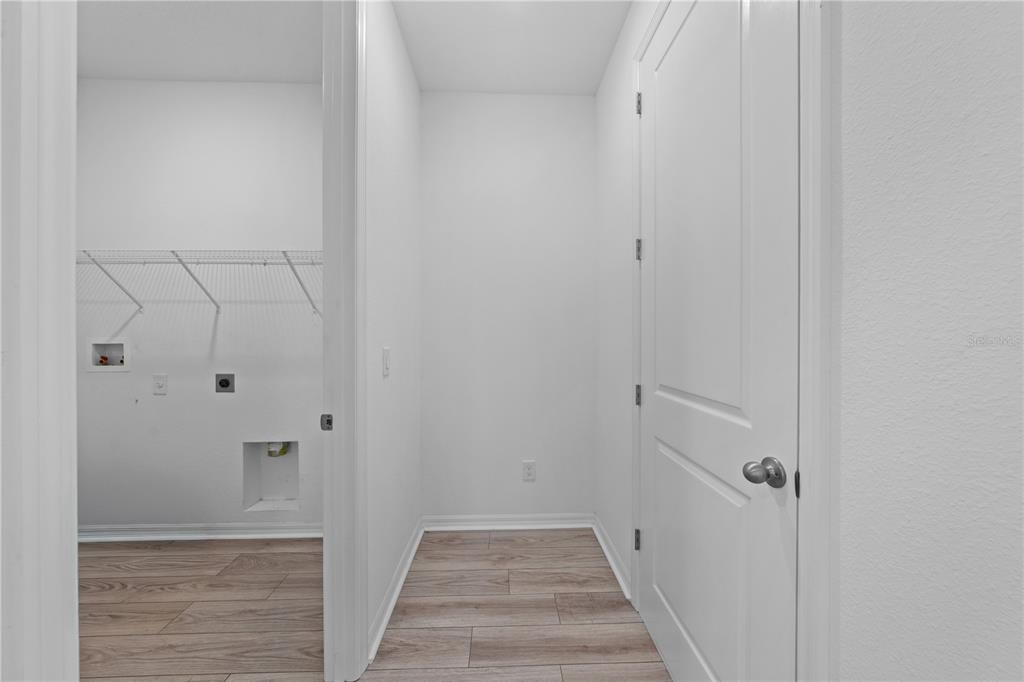 920 Livestock Loop St. Cloud, FL 34771 - Photo 40 of 55 a view of a hallway