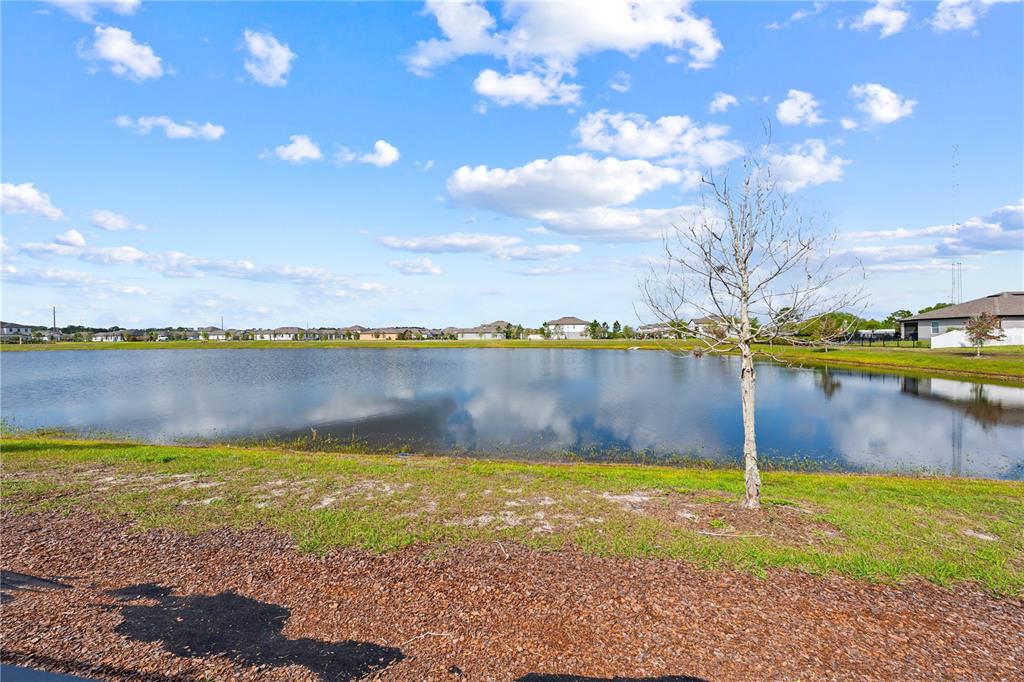 920 Livestock Loop St. Cloud, FL 34771 - Photo 55 of 55 a view of a swimming pool with an outdoor seating