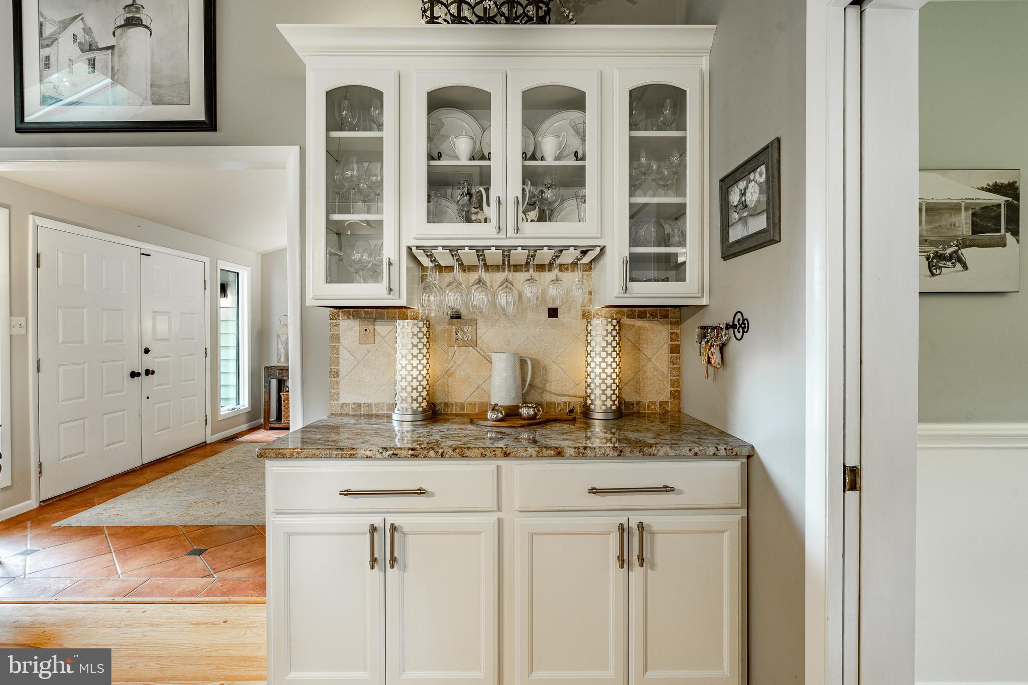 19 Ringfield Road, Unit 19 Chadds Ford, PA 19317 - Photo 15 of 39 a bathroom with a granite countertop sink and a mirror