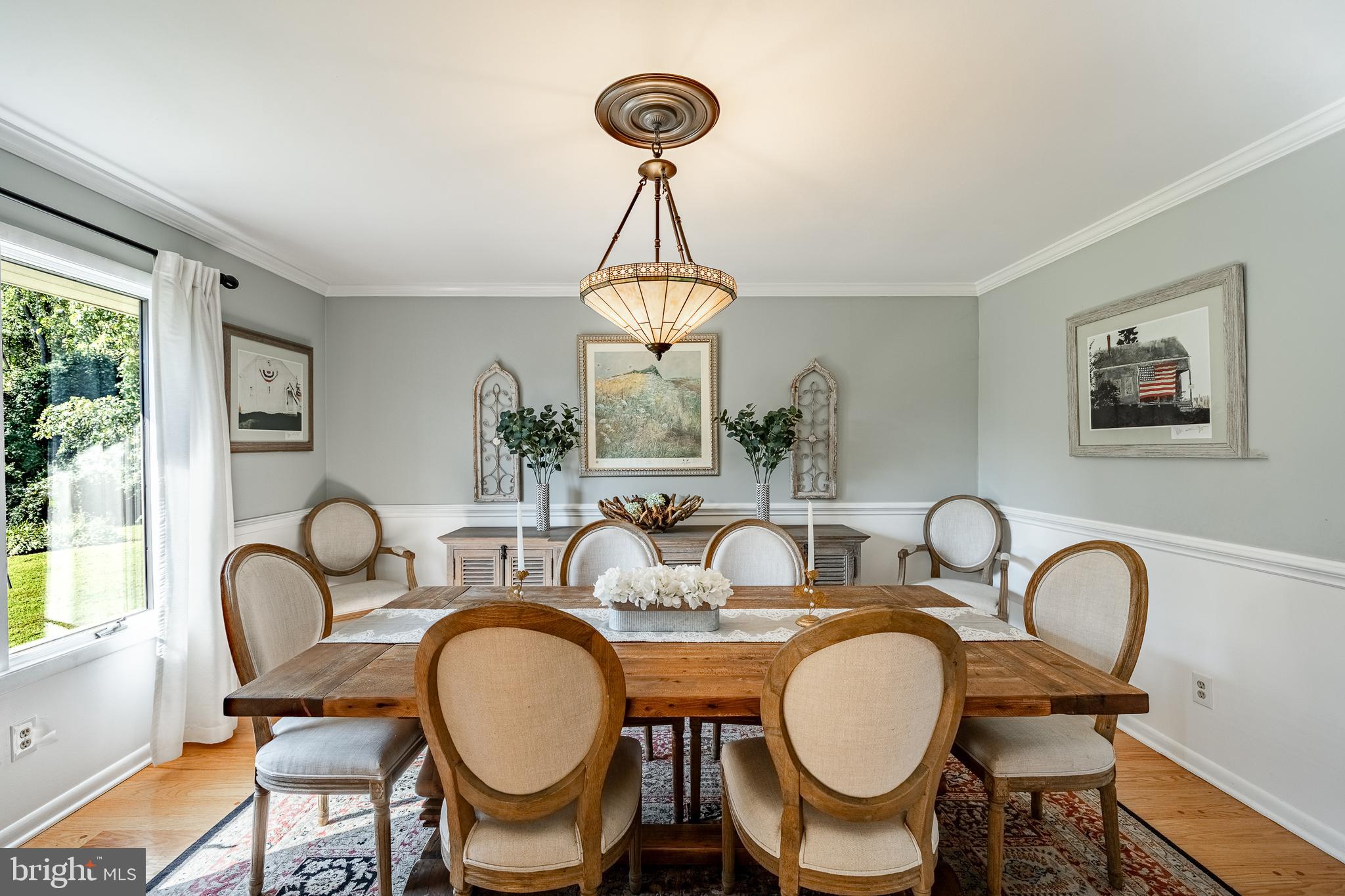 19 Ringfield Road, Unit 19 Chadds Ford, PA 19317 - Photo 17 of 39 a view of a dining room with furniture window and wooden floor