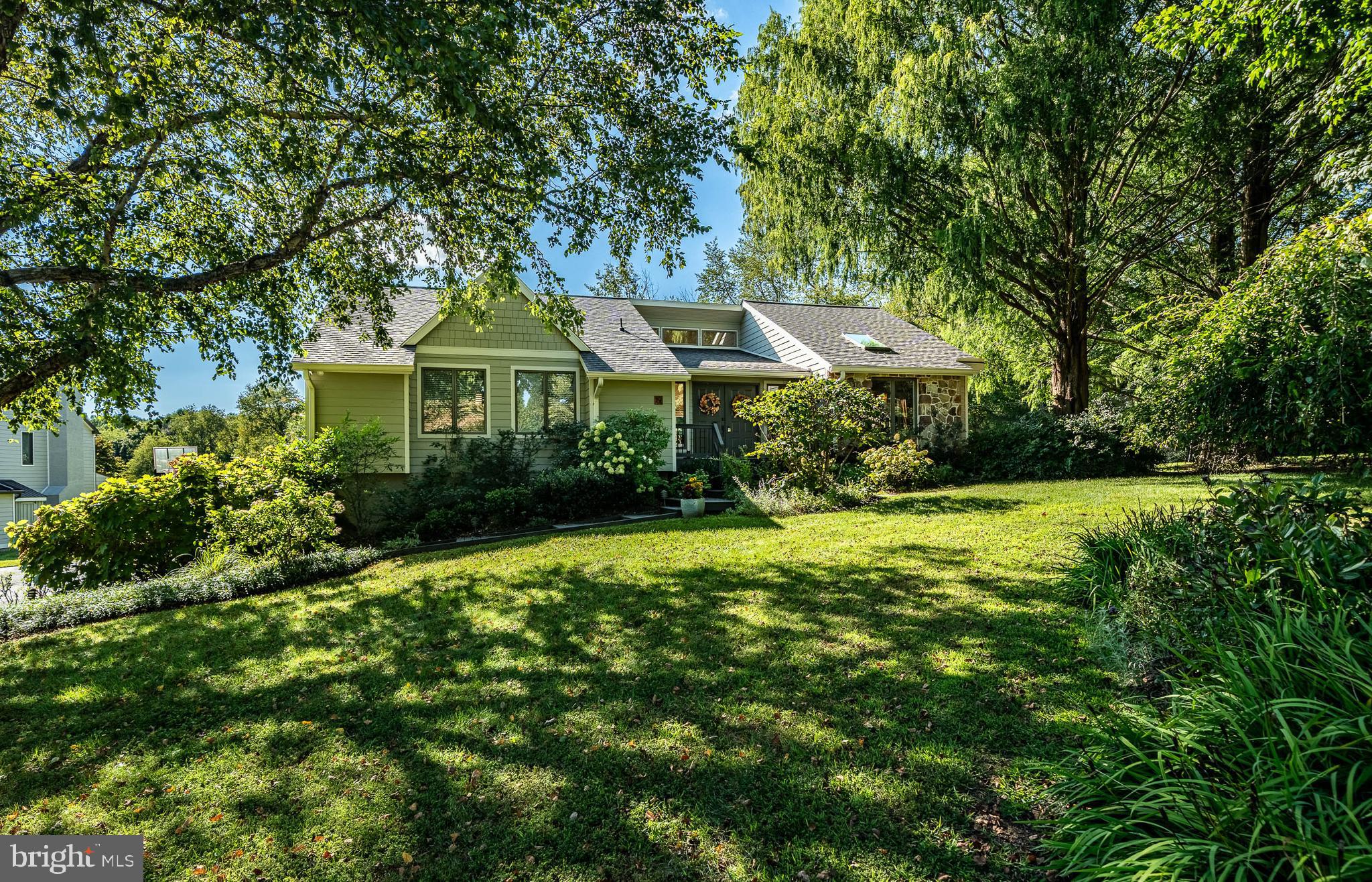 19 Ringfield Road, Unit 19 Chadds Ford, PA 19317 - Photo 2 of 39 a front view of a house with yard and green space