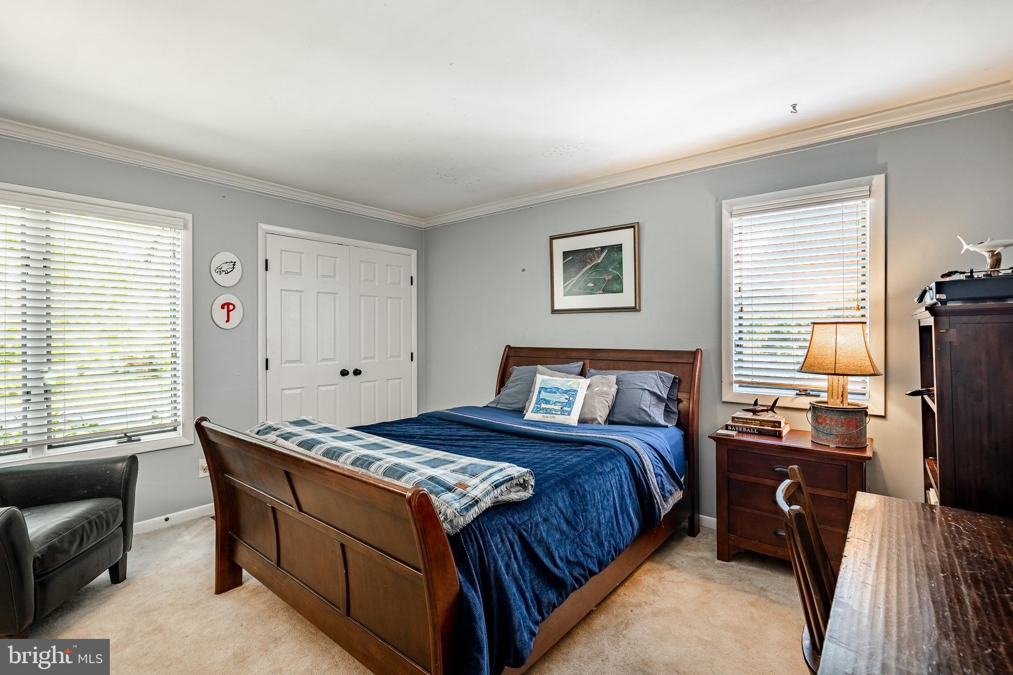 19 Ringfield Road, Unit 19 Chadds Ford, PA 19317 - Photo 24 of 39 a bed room with a bed and a couch