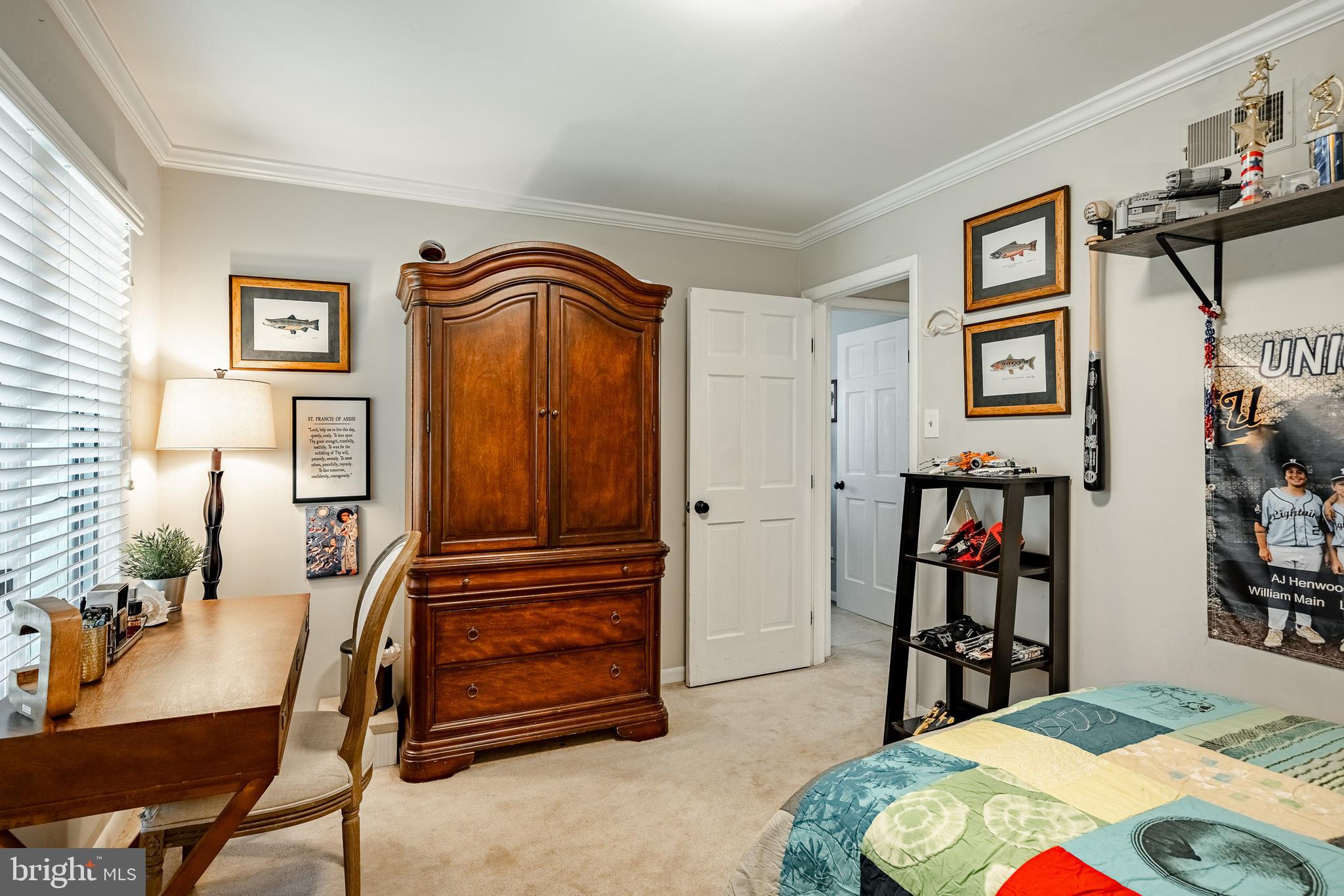 19 Ringfield Road, Unit 19 Chadds Ford, PA 19317 - Photo 26 of 39 a bedroom with a bed and furniture
