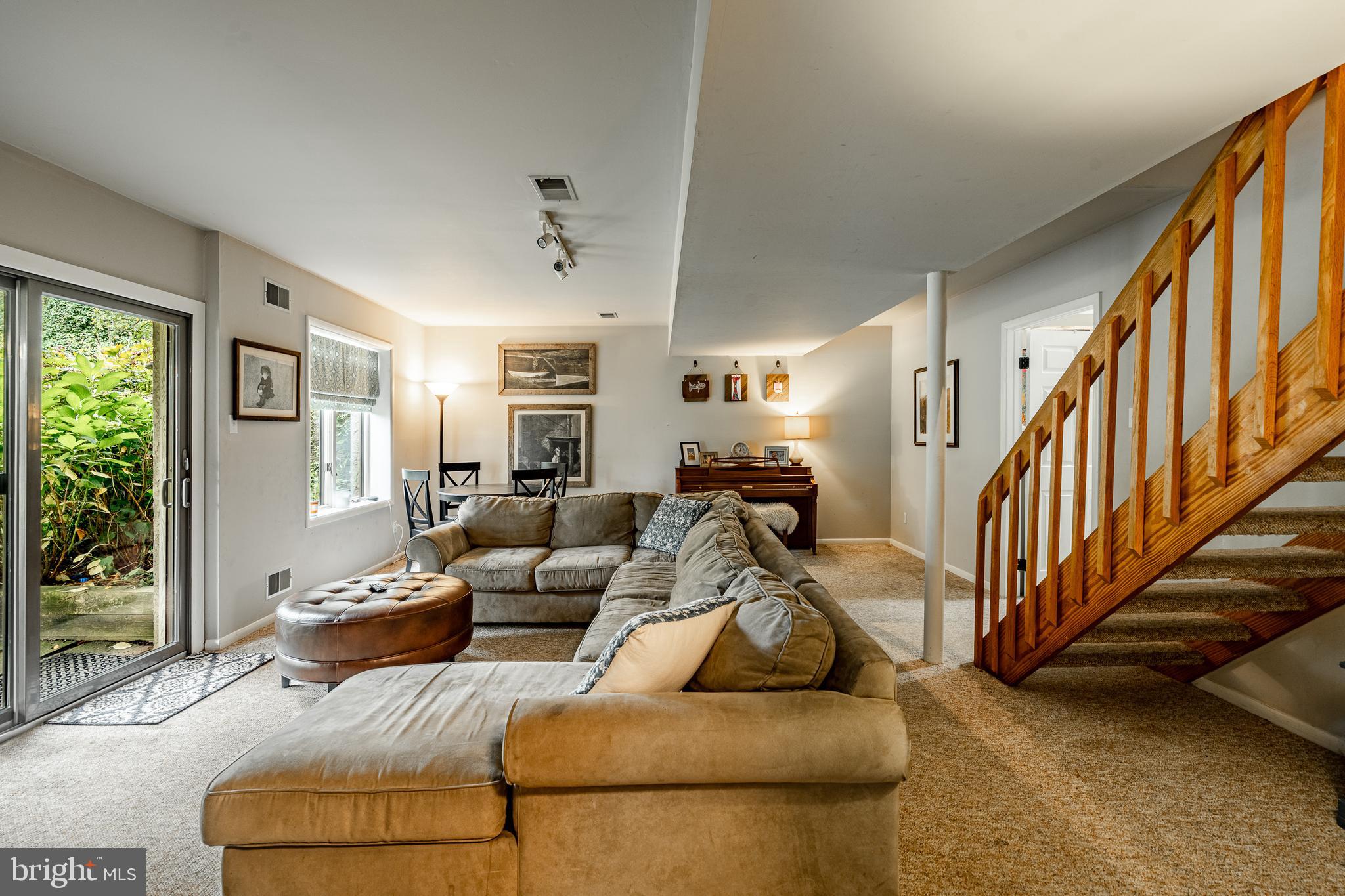 19 Ringfield Road, Unit 19 Chadds Ford, PA 19317 - Photo 30 of 39 a living room with furniture and stairs