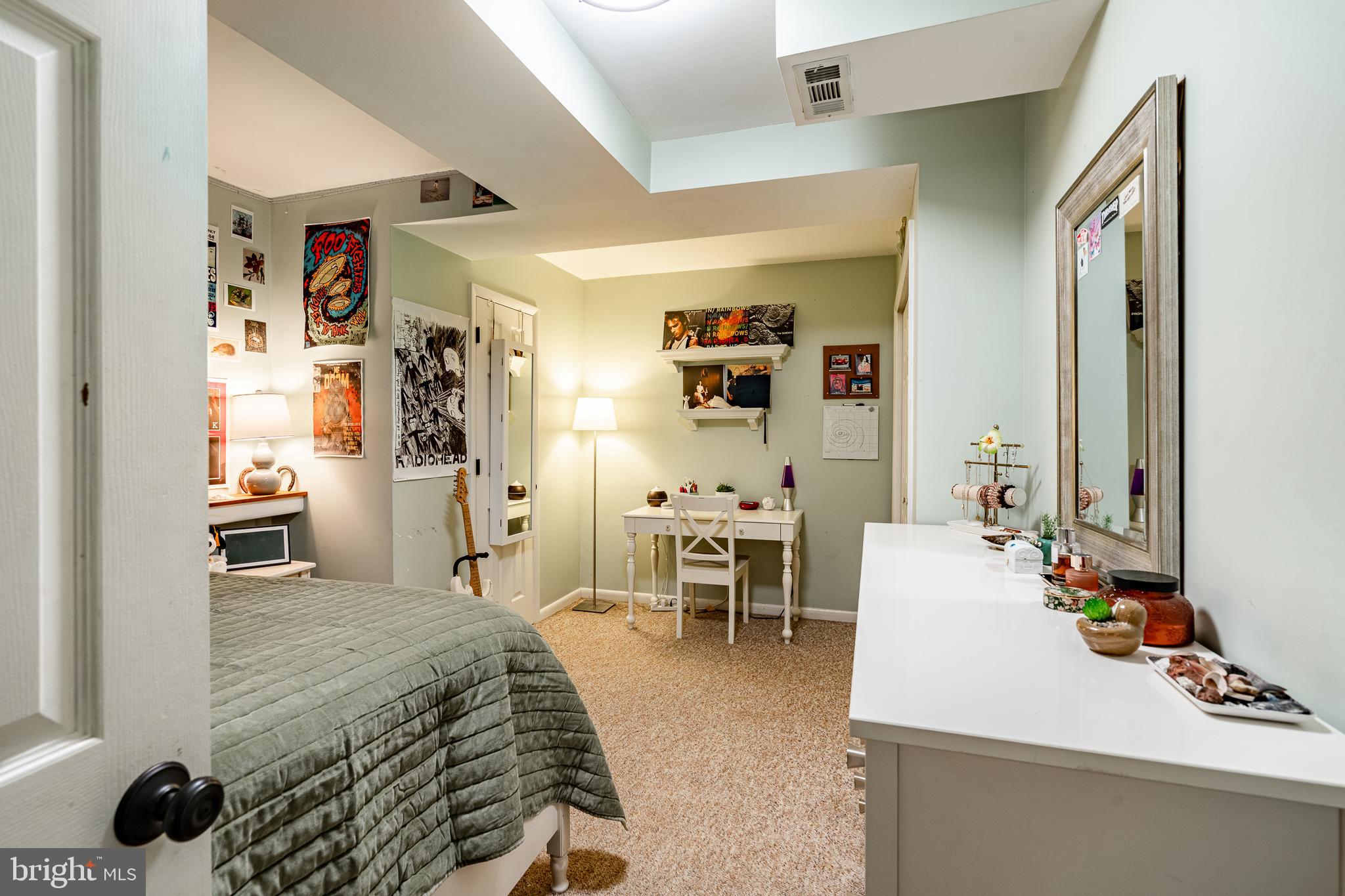 19 Ringfield Road, Unit 19 Chadds Ford, PA 19317 - Photo 31 of 39 a bedroom with furniture and a table