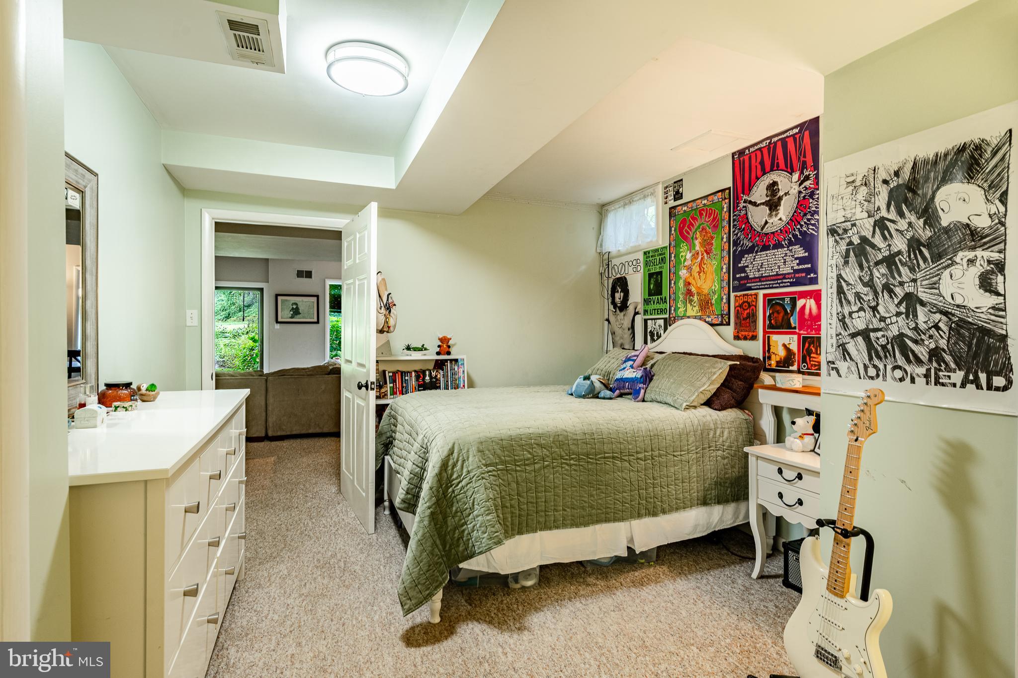 19 Ringfield Road, Unit 19 Chadds Ford, PA 19317 - Photo 32 of 39 a bedroom with bed and a mirror