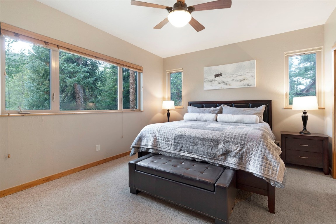 9 Davis Court Blue River, CO 80424 - Photo 18 of 44 a bedroom with a bed and window