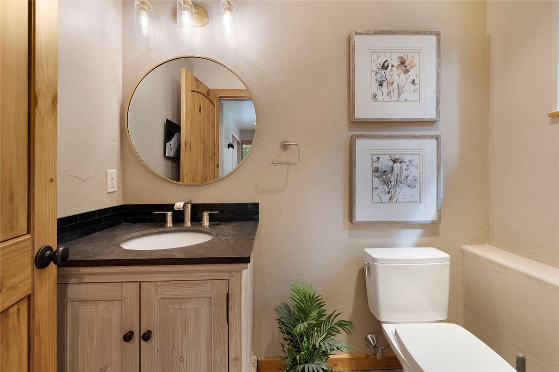 9 Davis Court Blue River, CO 80424 - Photo 24 of 44 a bathroom with a toilet and a sink