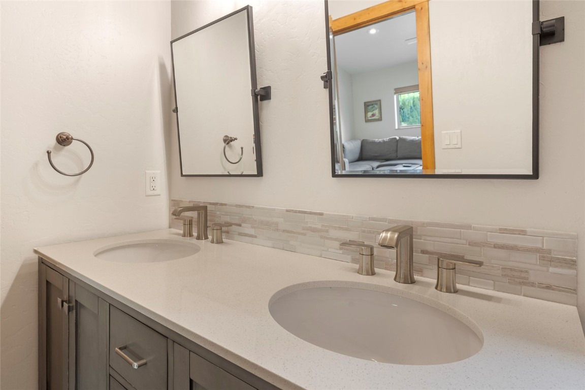 9 Davis Court Blue River, CO 80424 - Photo 28 of 44 a bathroom with a sink and a mirror