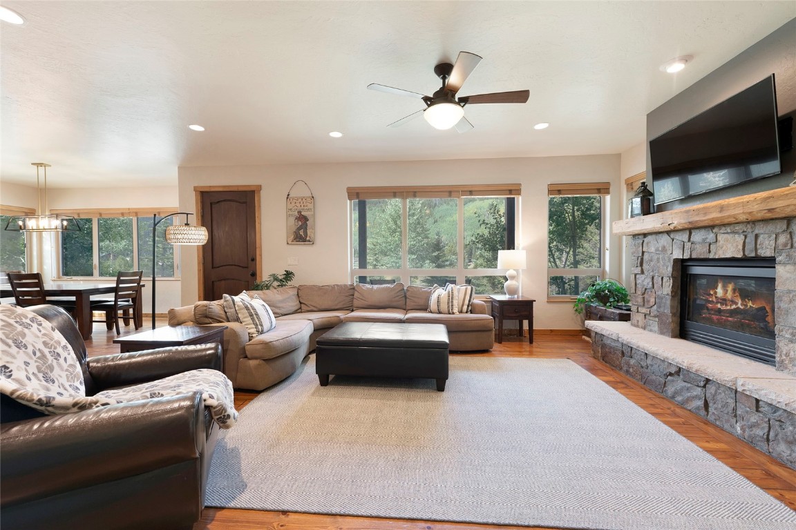 9 Davis Court Blue River, CO 80424 - Photo 7 of 44 a living room with furniture fireplace and flat screen tv