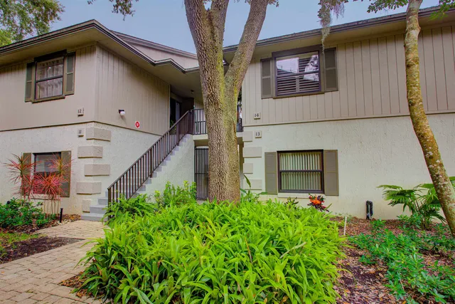 front view of a house with a small yard
