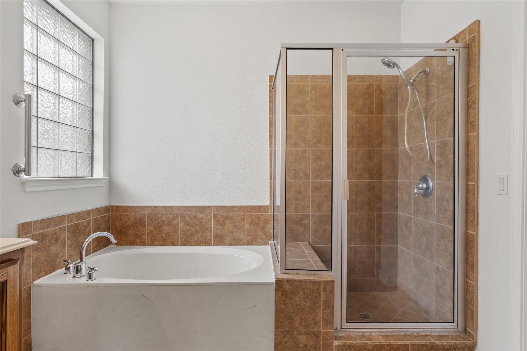 4612 Sonora Trace Georgetown, TX 78633 - Photo 27 of 36 a bathroom with a bathtub and shower