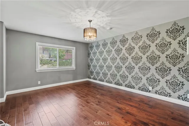 a view of a bathroom with a shower and a glass door