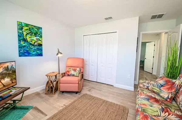 a bedroom with a bed and furniture