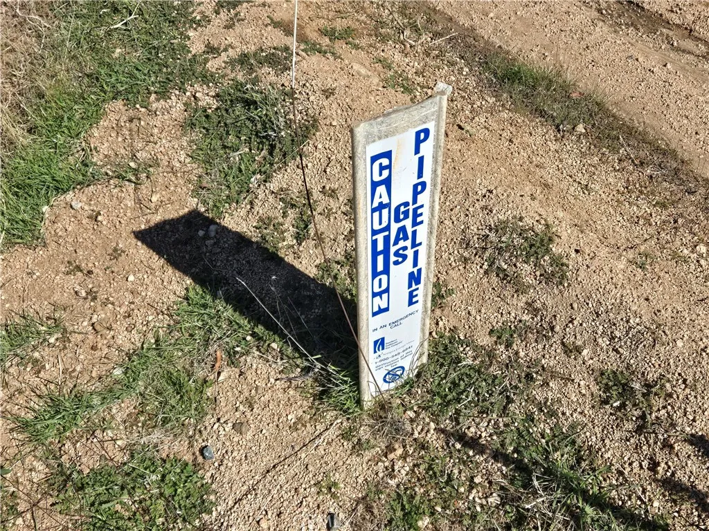 0 White Feather Road Acton, CA 93510 - Photo 10 of 24 a sign board with tall trees