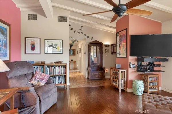 a living room with furniture and a window