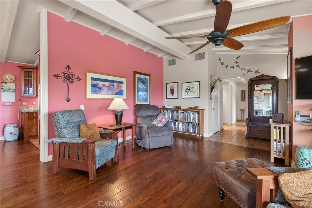 11543 Tulane Avenue Riverside, CA 92507 - Photo 16 of 49 This view shows the open feel of the living space. To the right is the hallway leading to the bedrooms. To the left, around the partition wall, you'll find the kitchen.