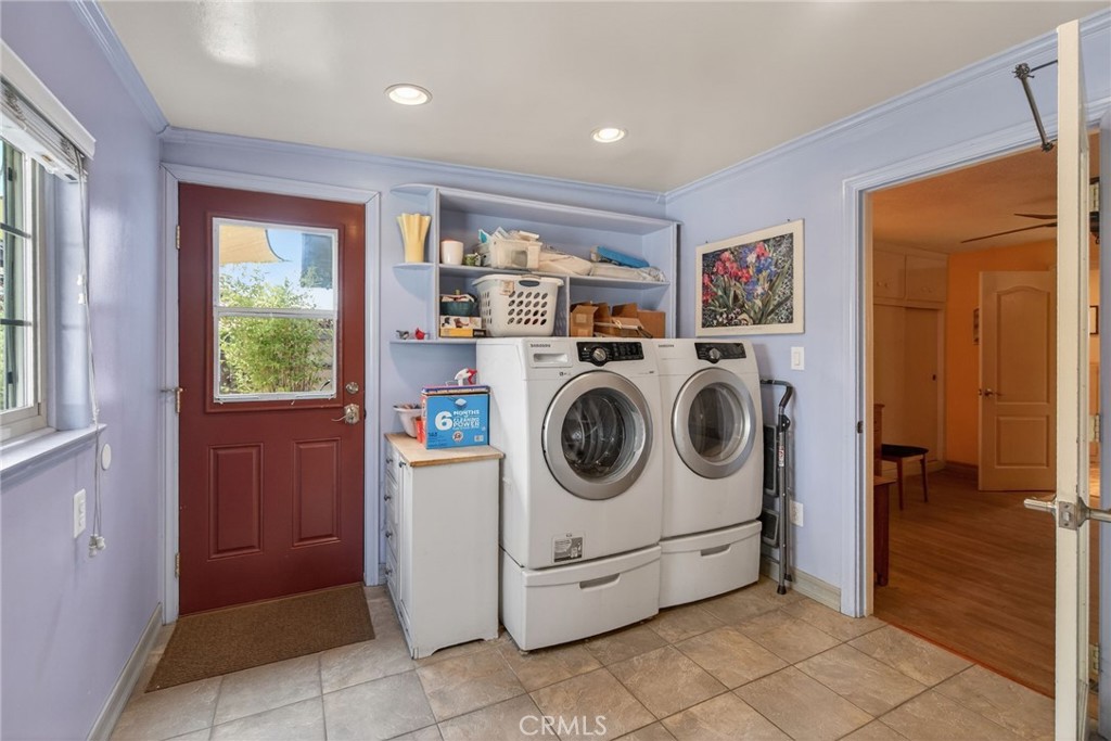 11543 Tulane Avenue Riverside, CA 92507 - Photo 24 of 49 The laundry room is open, with access to the back yard, and Bedroom #1.
