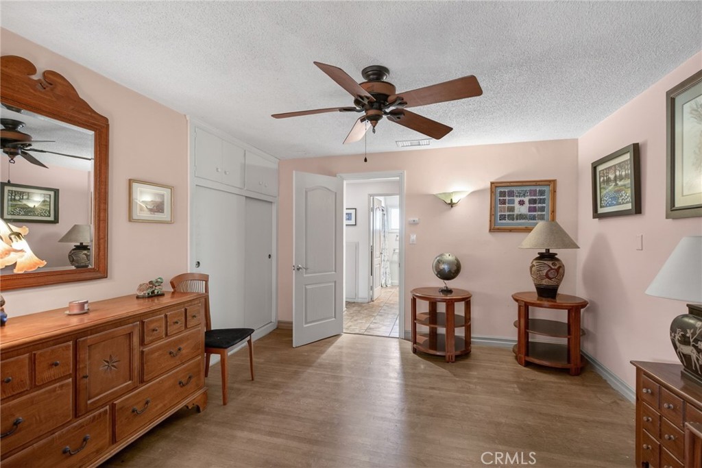 11543 Tulane Avenue Riverside, CA 92507 - Photo 25 of 49 Bedroom #1 features hardwood floors, and a large closet.