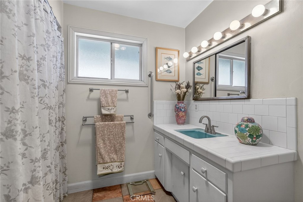 11543 Tulane Avenue Riverside, CA 92507 - Photo 28 of 49 The Hall Bathroom