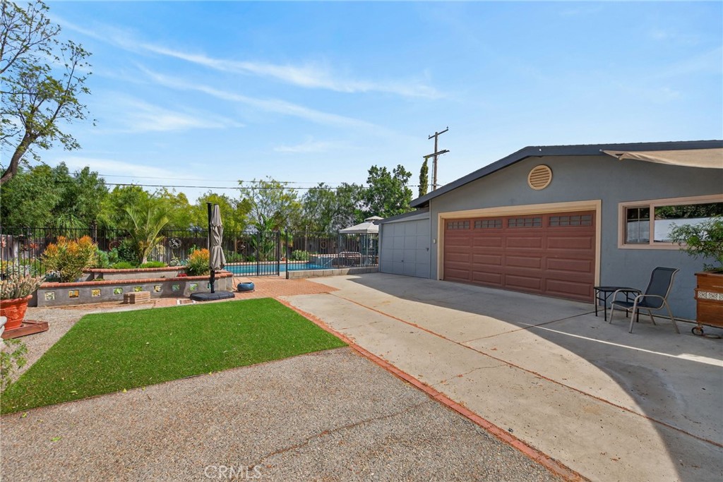 11543 Tulane Avenue Riverside, CA 92507 - Photo 36 of 49 The garage also has extra space for storage and a workshop.