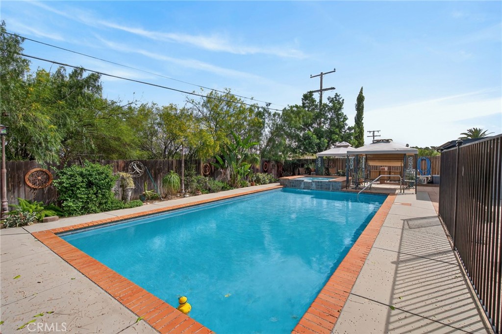11543 Tulane Avenue Riverside, CA 92507 - Photo 37 of 49 The pool and spa are here to help you unwind and relax.