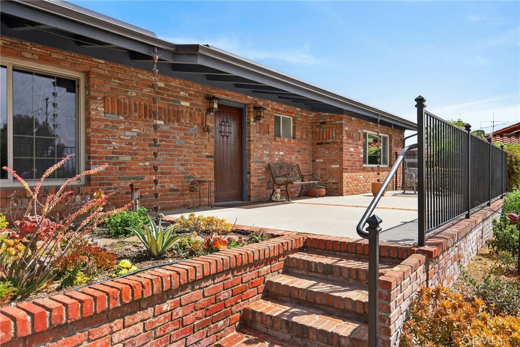 11543 Tulane Avenue Riverside, CA 92507 - Photo 5 of 49 The front porch welcomes you to this mid-century style home. The views from the porch are spectacular.
