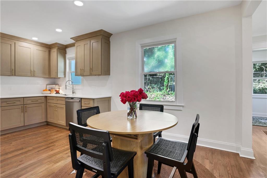 207 Walthall Street Marietta, GA 30064 - Photo 18 of 42 a kitchen with a dining table chairs and sink