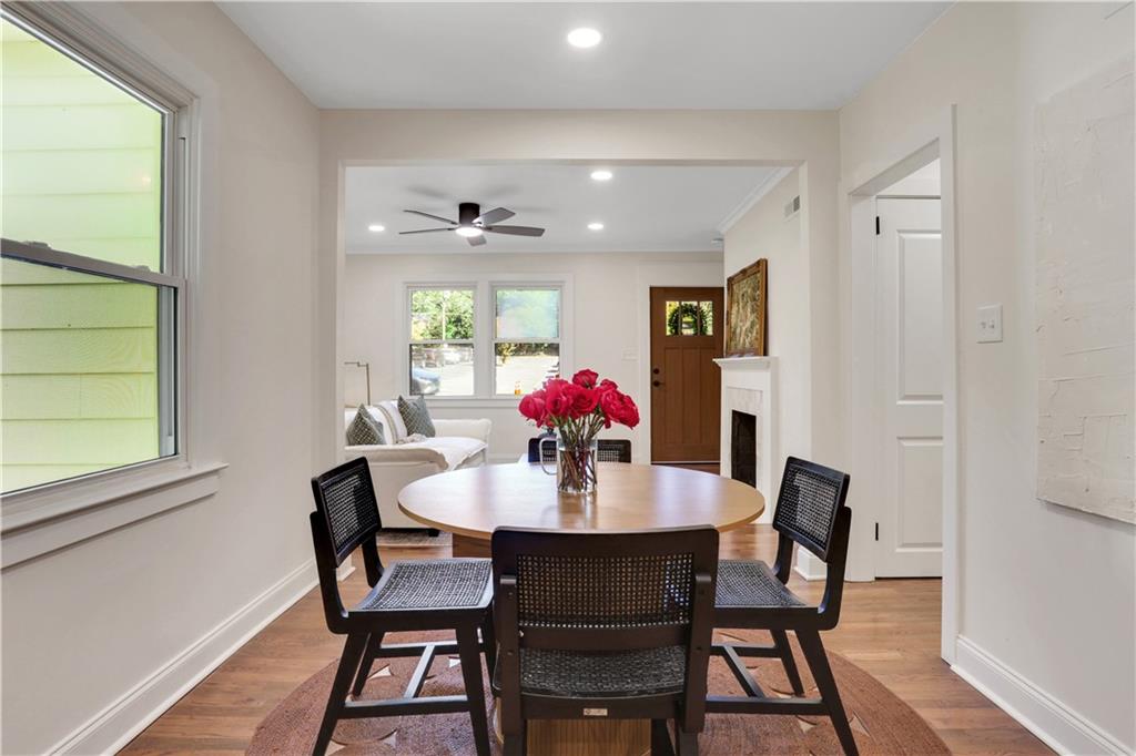 207 Walthall Street Marietta, GA 30064 - Photo 19 of 42 a view of a dining room with furniture and wooden floor