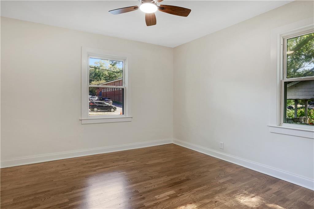 207 Walthall Street Marietta, GA 30064 - Photo 30 of 42 wooden floor in an empty room with a window