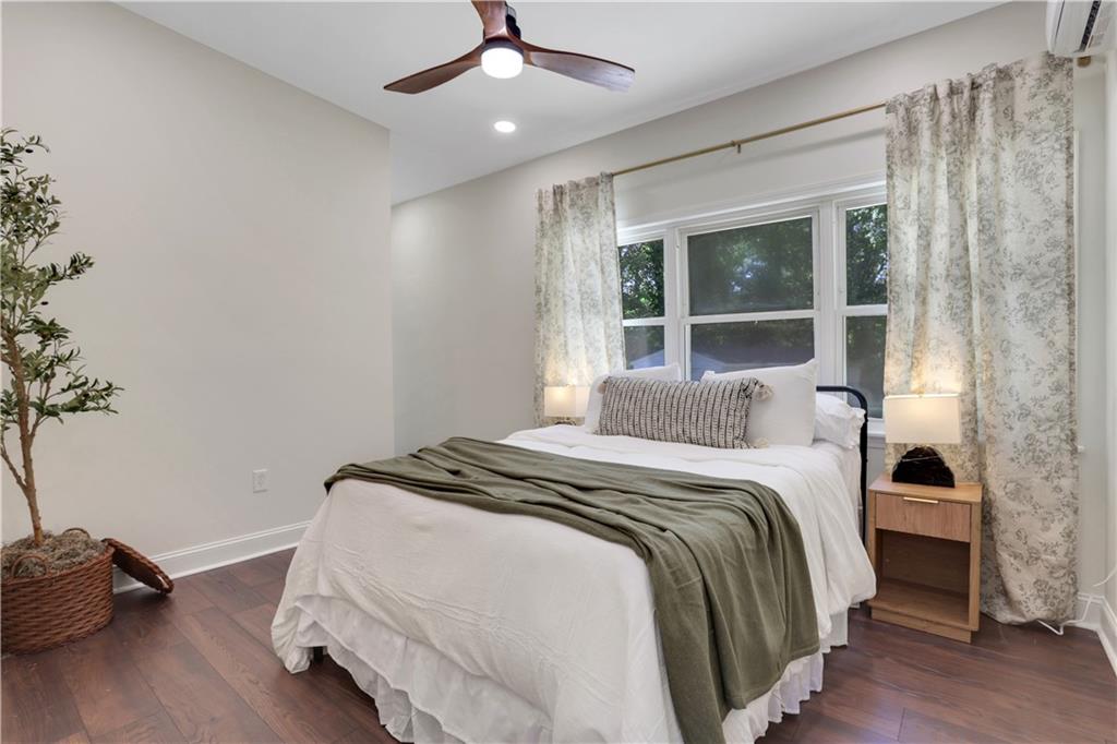 207 Walthall Street Marietta, GA 30064 - Photo 4 of 42 a bedroom with a bed and a window