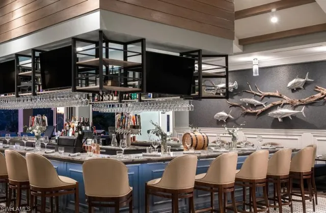 a view of balcony with wooden floor and fence