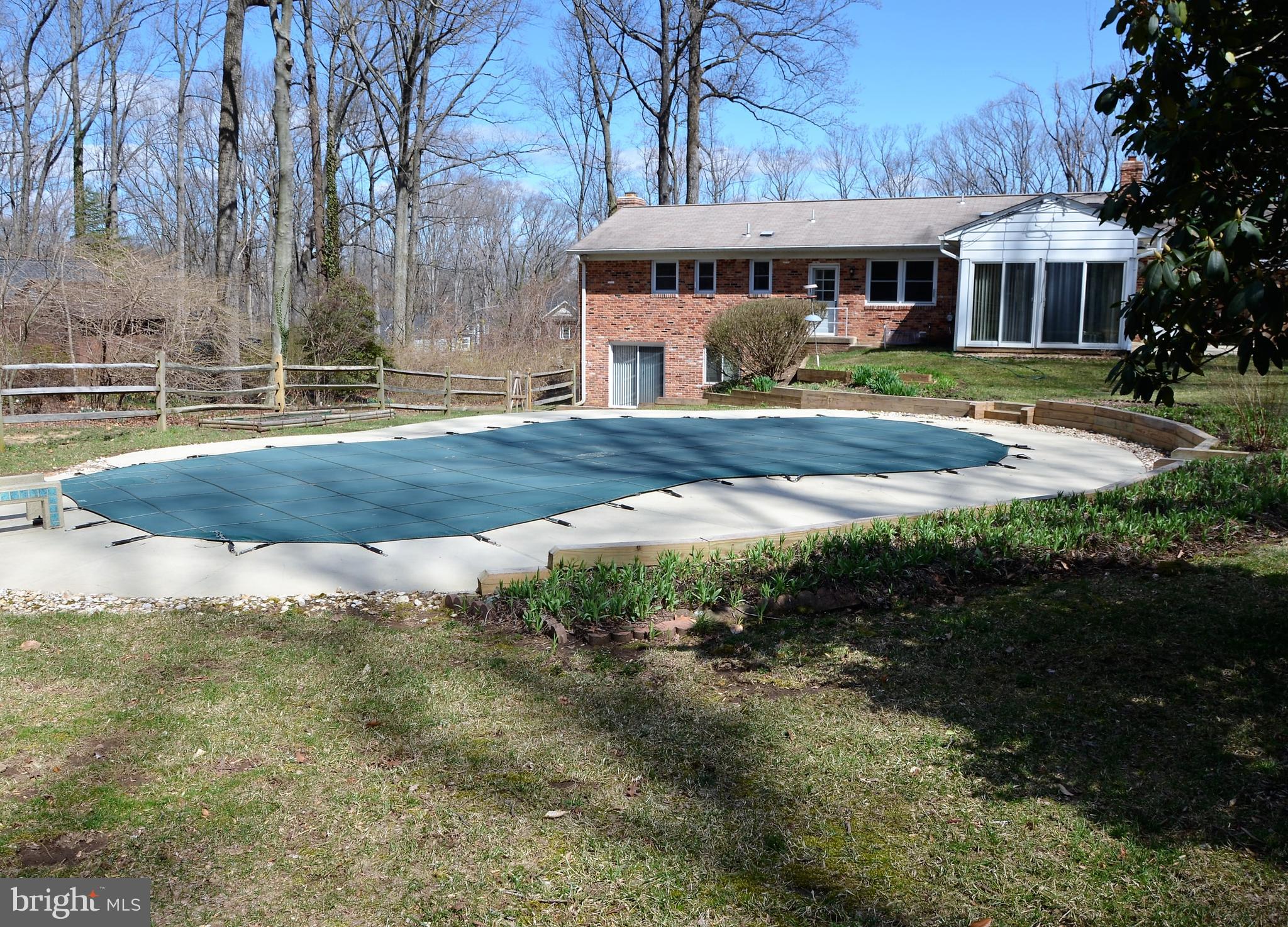 15930 Woods Center Road Silver Spring, MD 20906 - Photo 2 of 33 Great open backyard with large pool.