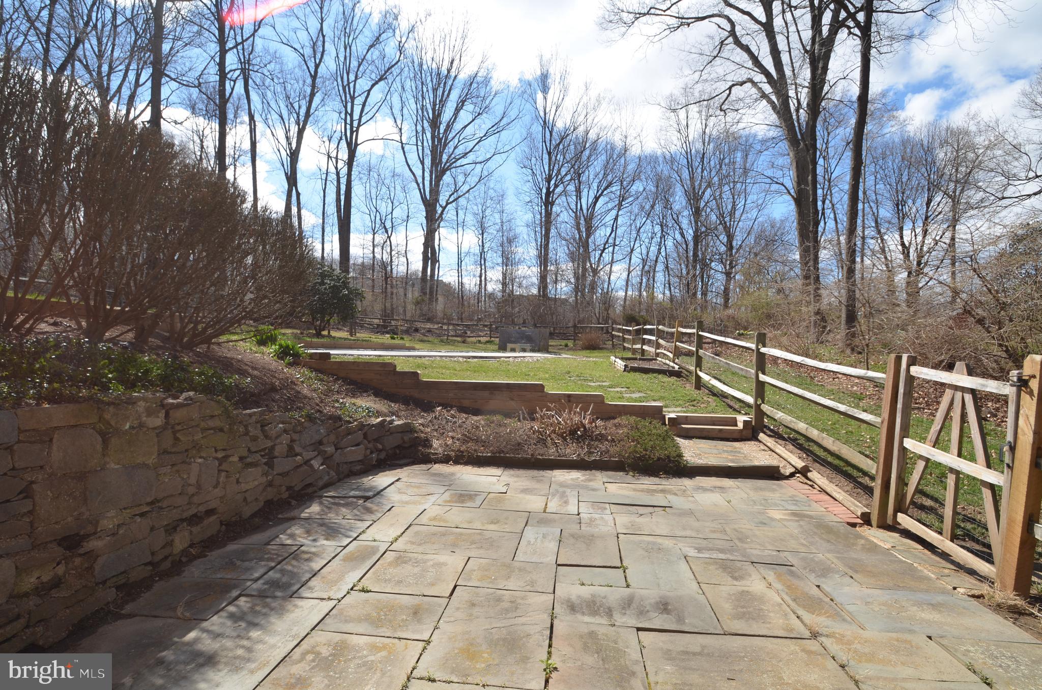 15930 Woods Center Road Silver Spring, MD 20906 - Photo 30 of 33 Side patio out of lower level