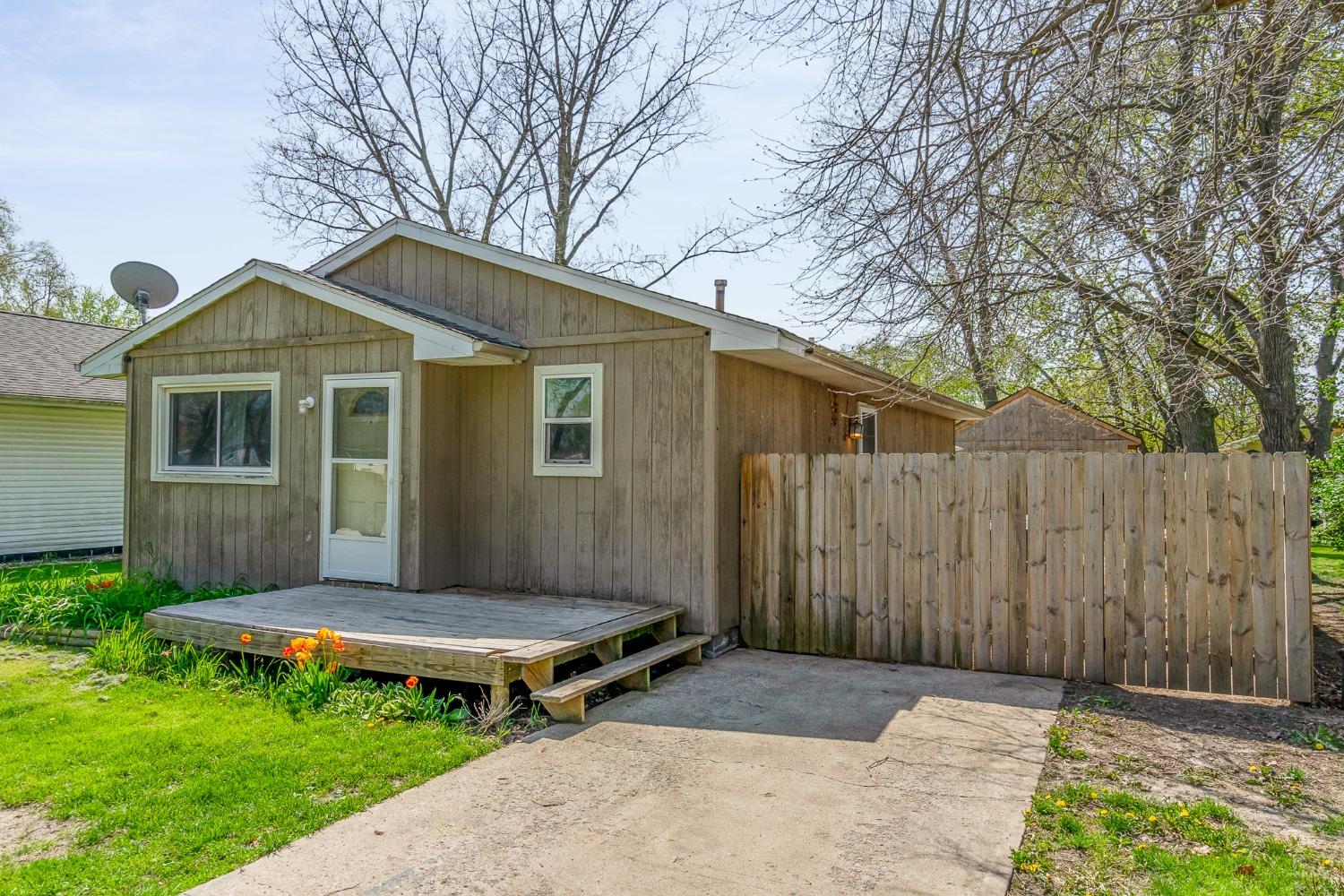 704-3 Juniper Road Valparaiso, IN 46385 - Photo 1 of 24 a front view of a house with a yard