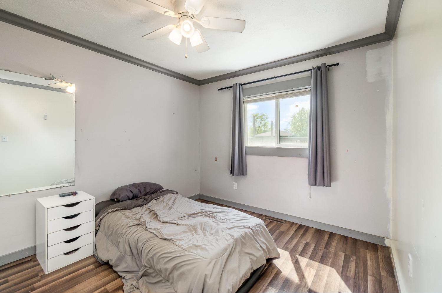 704-3 Juniper Road Valparaiso, IN 46385 - Photo 12 of 24 a bedroom with a bed and a window