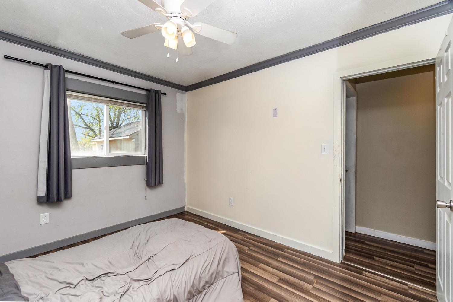 704-3 Juniper Road Valparaiso, IN 46385 - Photo 14 of 24 a bedroom with a bed and a window